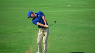 'Battling' McIlroy closes in on Race to Dubai title