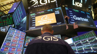 Wall Street continue de tutoyer les sommets