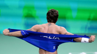 Italy edge into Davis Cup final with epic tie-break
